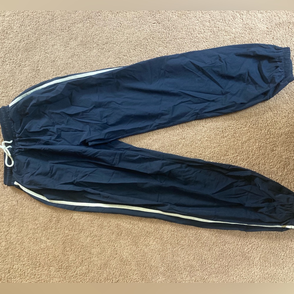 Track pants! navy blue with white stripes and metal tip laces!